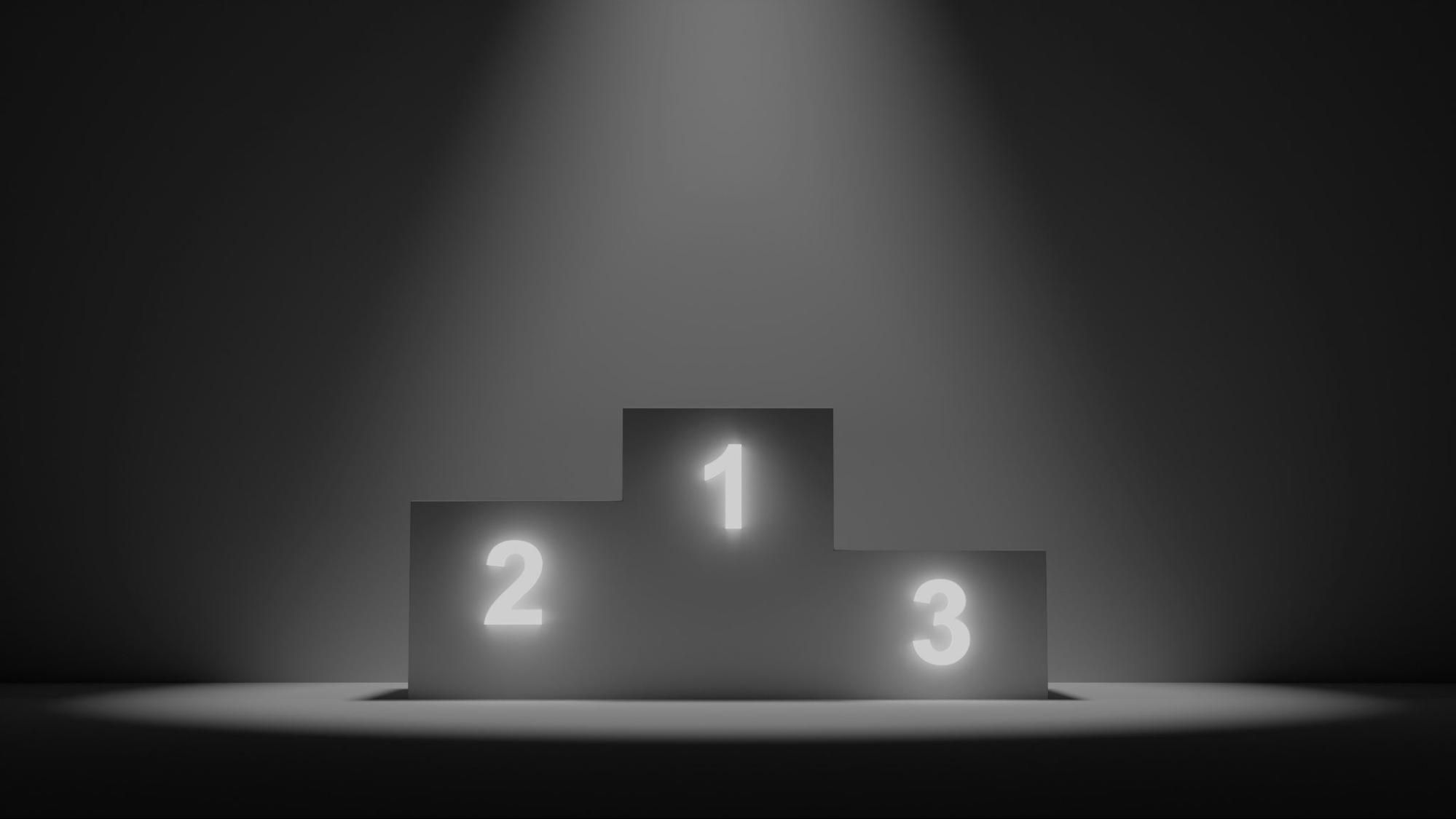 A three level podium labeled 1, 2, and 3